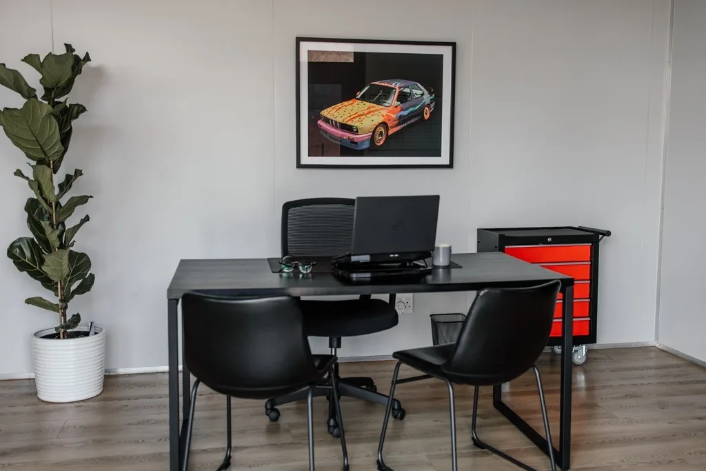 Trade Wheels office with automotive art