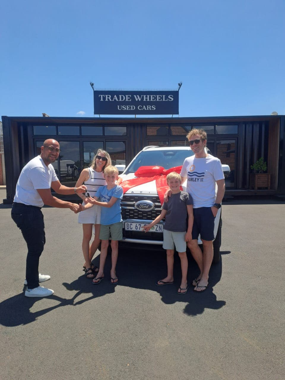 Family collecting their new Ford